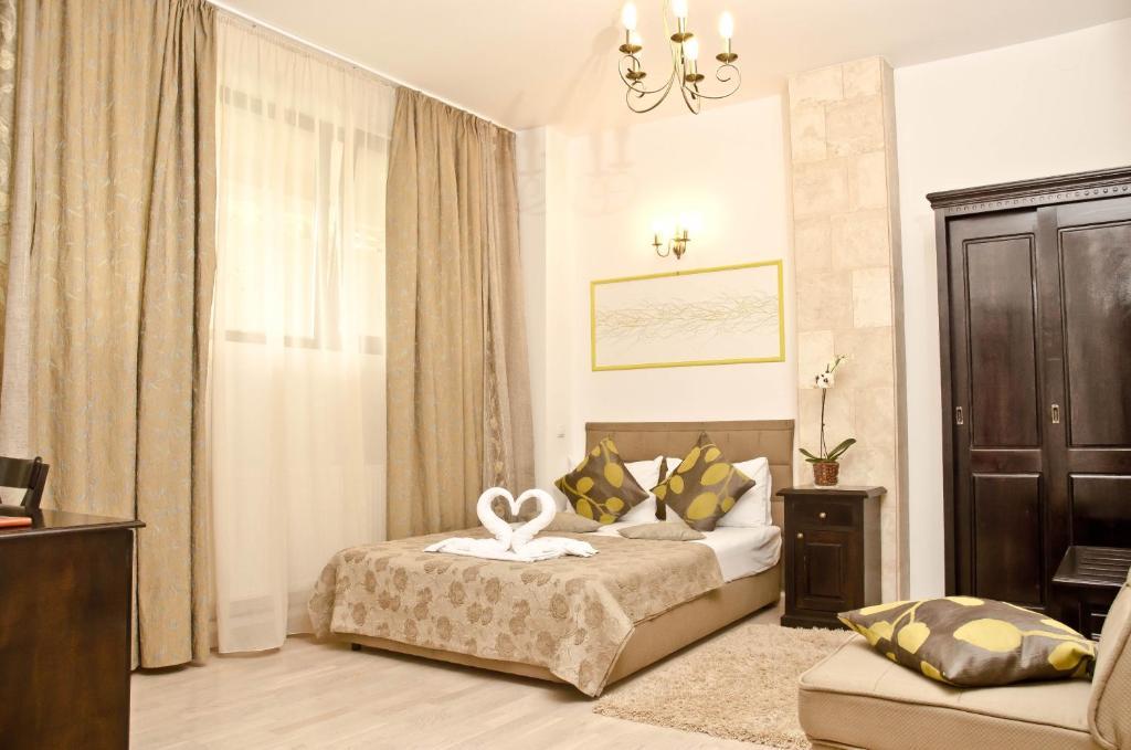 Hotel Belleville Яш Стая снимка